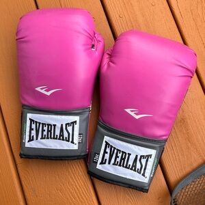 Pink women’s Everlast boxing gloves with carrier. Used once. I had big plans!